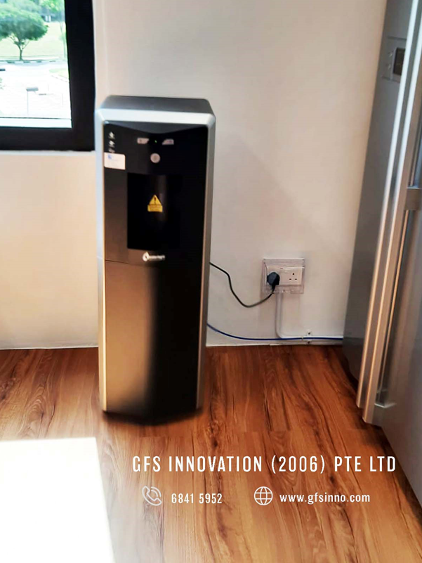 Waterlogic UV standing water dispenser at an office pantry